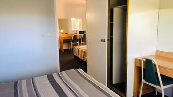 Desk, blackout curtains, soundproofing, free WiFi