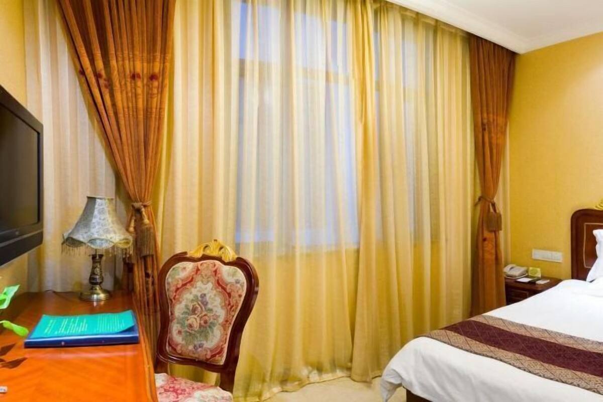 Pillow-top beds, desk, blackout curtains, cots/infant beds