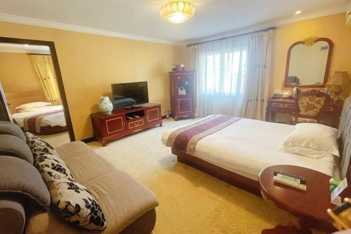 Pillow-top beds, desk, blackout curtains, cots/infant beds