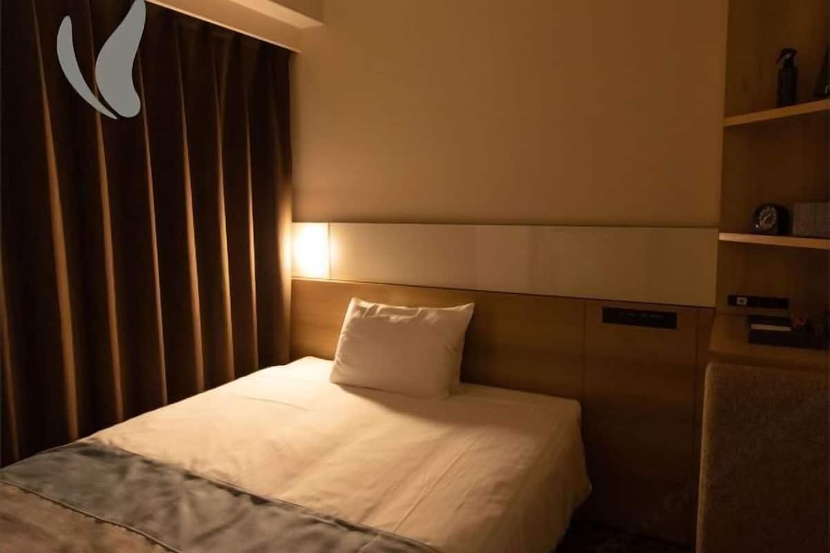 Down duvets, blackout curtains, free WiFi, bed sheets