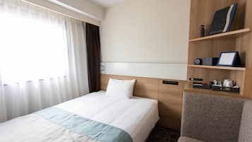 Down comforters, blackout drapes, WiFi (free), bed sheets
