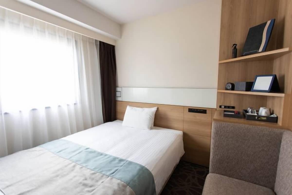 Down duvets, blackout curtains, free WiFi, bed sheets