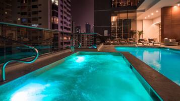 Outdoor pool, pool umbrellas, sun loungers