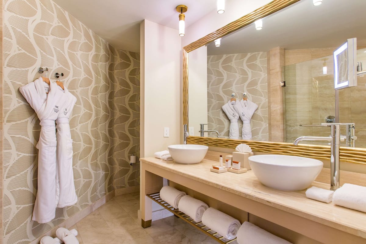 deluxe room, 2 double beds, non smoking | bathroom | shower, rainfall showerhead, free toiletries, hair dryer