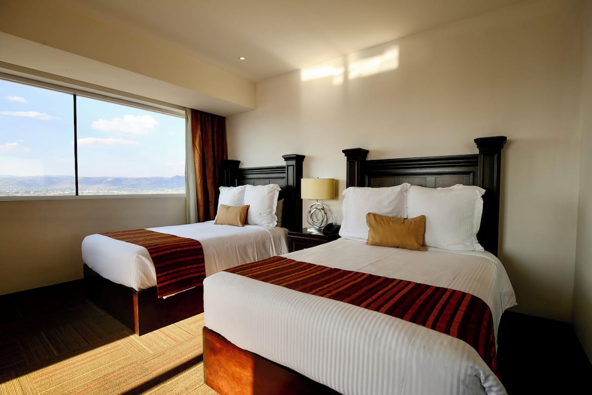 Junior Double Room, 2 Bedrooms, City View | Gebar bulu kapas, tilam berlapik, meja, ruang kerja komputer riba