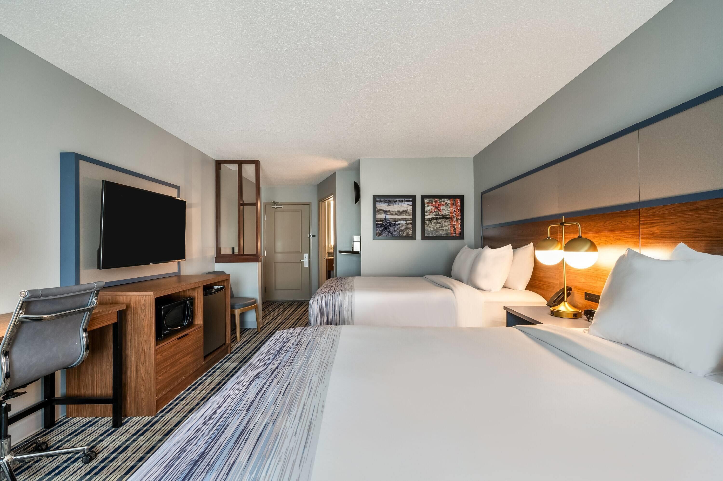 Room, 2 Queen Beds, Non Smoking | Premium bedding, individually decorated, individually furnished, desk