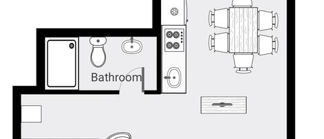 Plano de un cuarto de hotel que incluye un baño, un dormitorio, un comedor y una kitchenette.