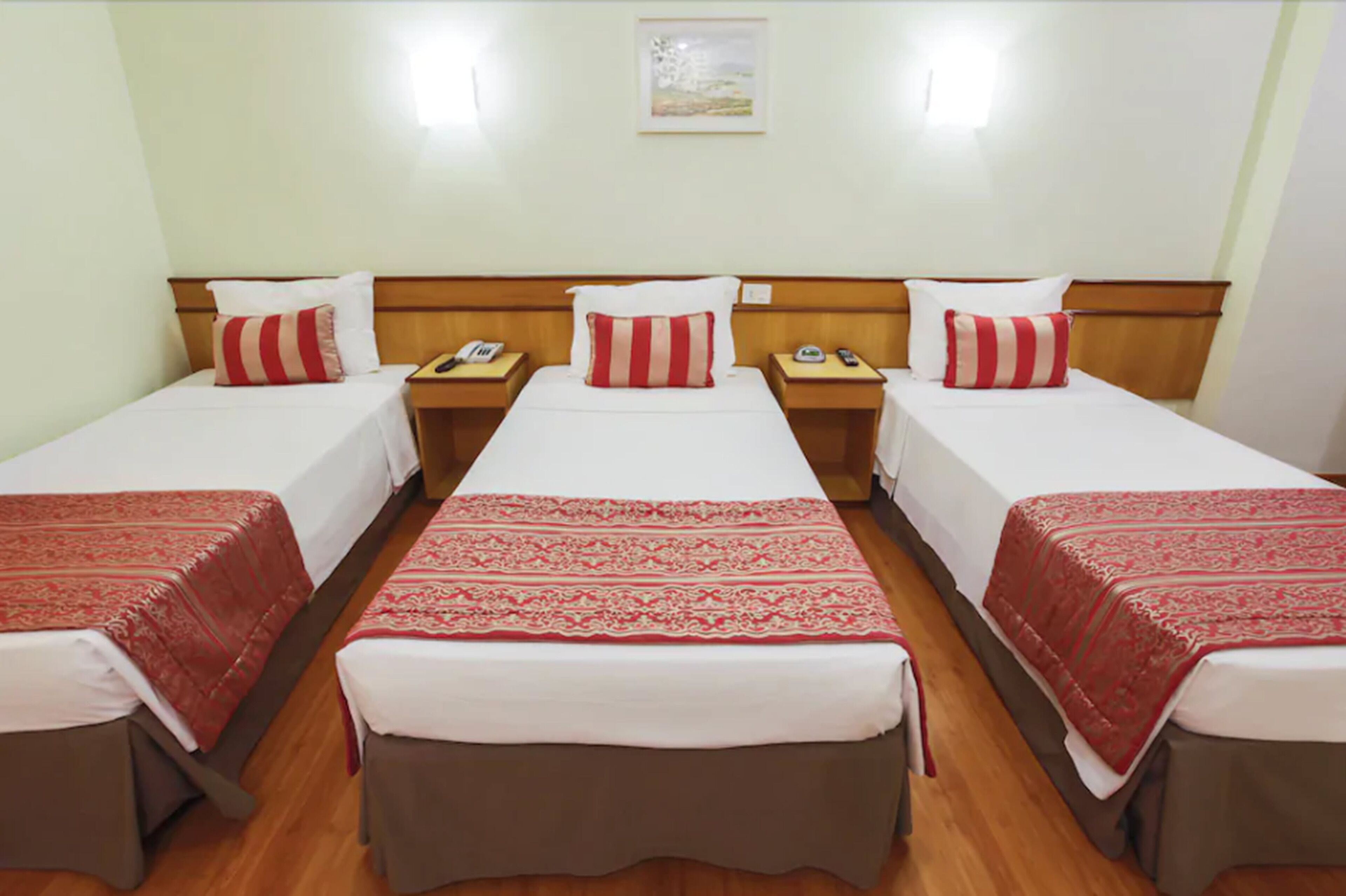 triple room, 3 single beds | minibar, in-room safe, blackout curtains, soundproofing