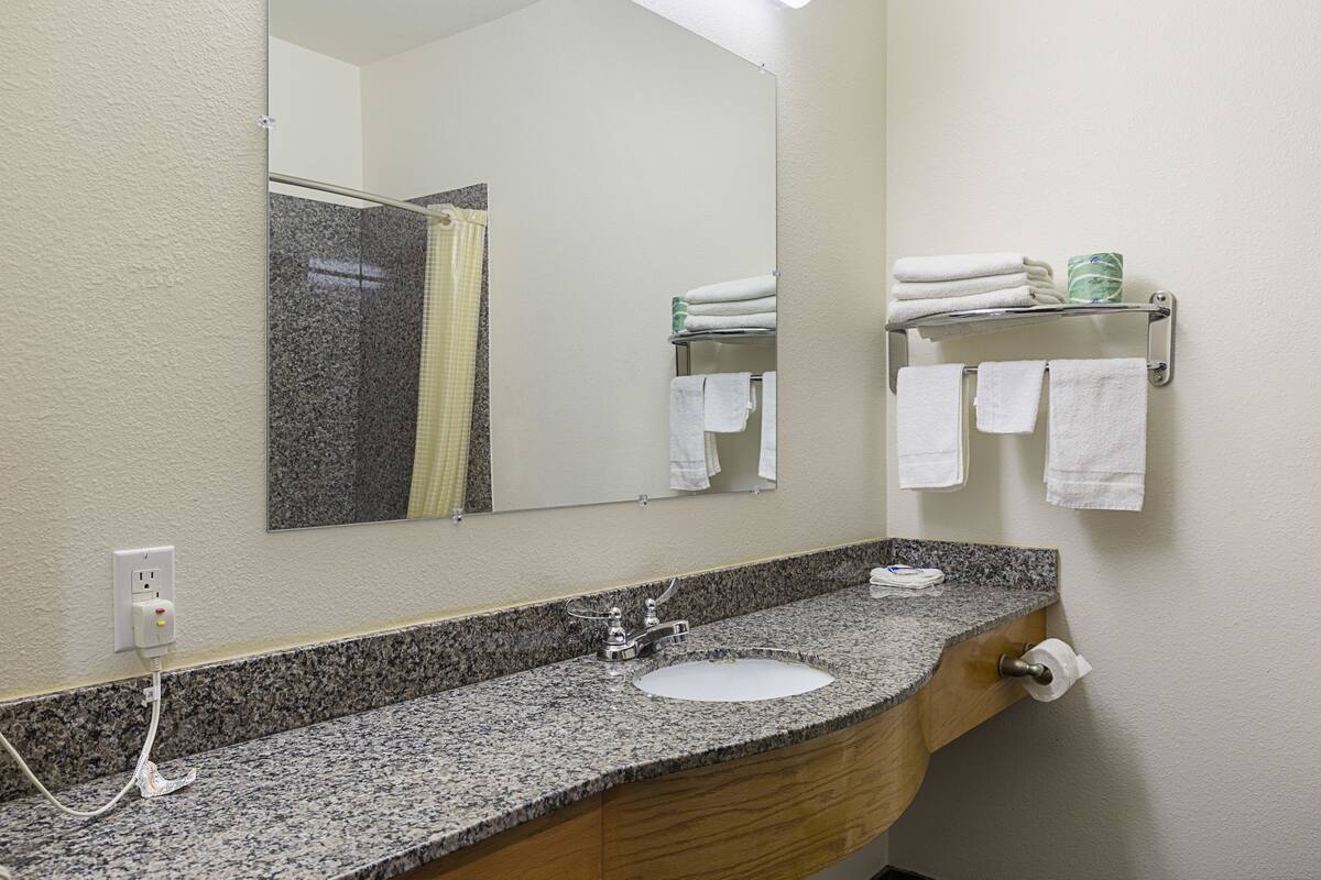 standard room, 2 queen beds, non smoking, kitchenette | bathroom | shower, hair dryer, towels