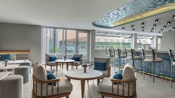 Outdoor pool, open 6:00 AM to 10 PM, pool cabanas (surcharge)