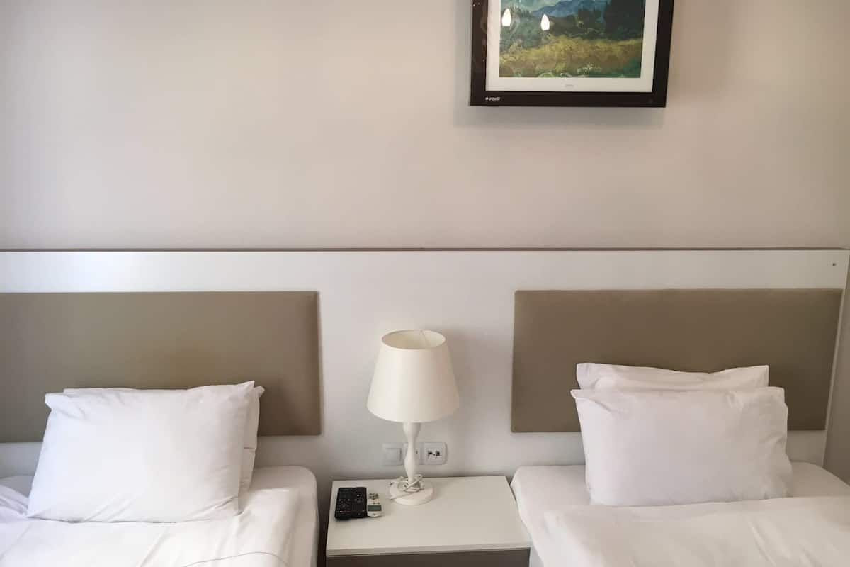 Twin room Garden view Single Use | 1 bedroom, minibar, in-room safe, free WiFi