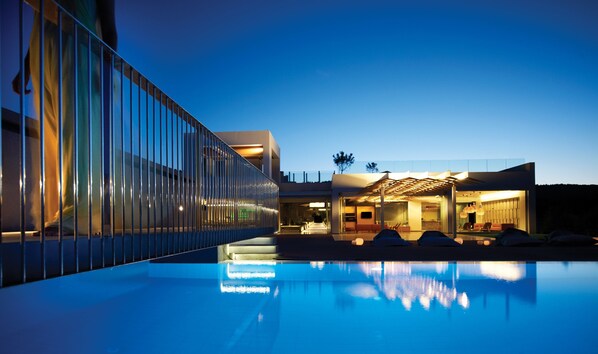 Seasonal outdoor pool, pool umbrellas, pool loungers