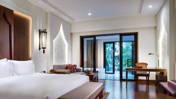 Premium Room, 1 King Bed, Balcony, Garden View | Minibar, in-room safe, desk, iron/ironing board