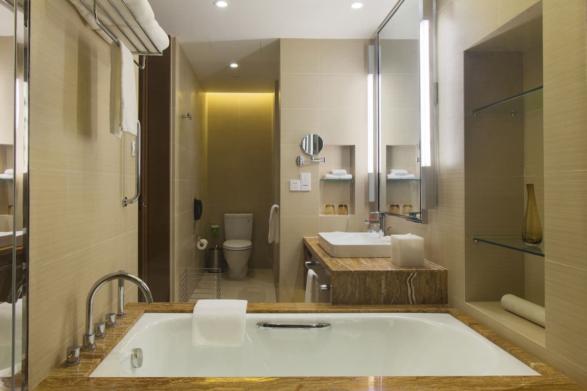 shower, hair dryer, bathrobes, slippers