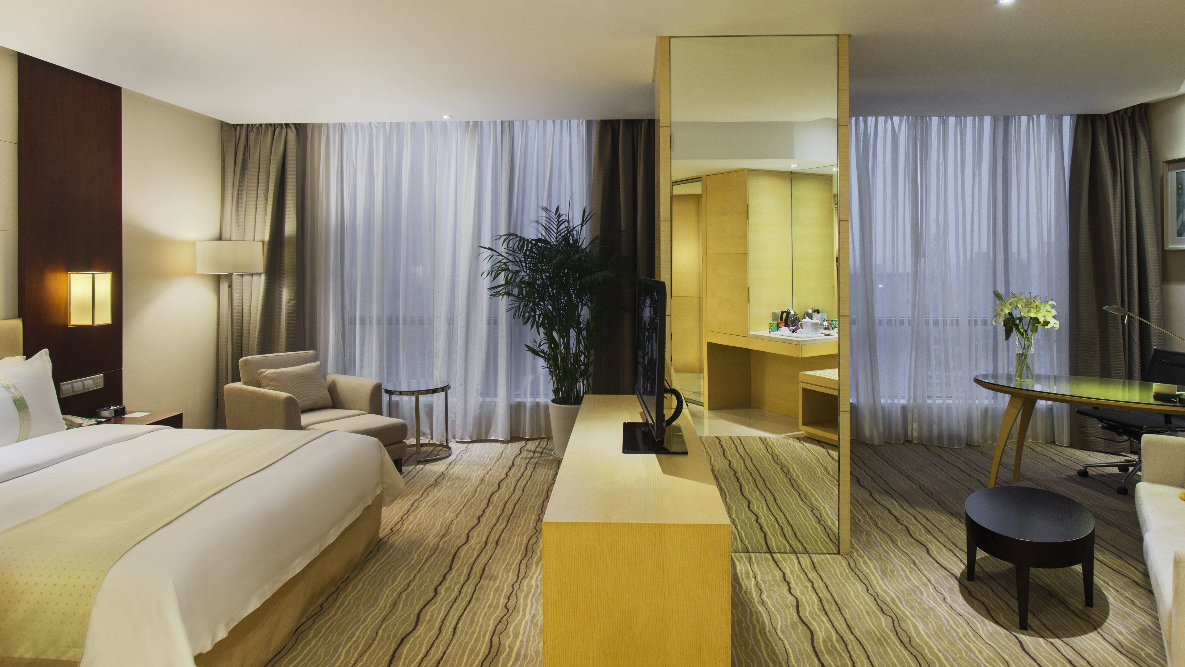 hypo-allergenic bedding, down duvets, minibar, in-room safe