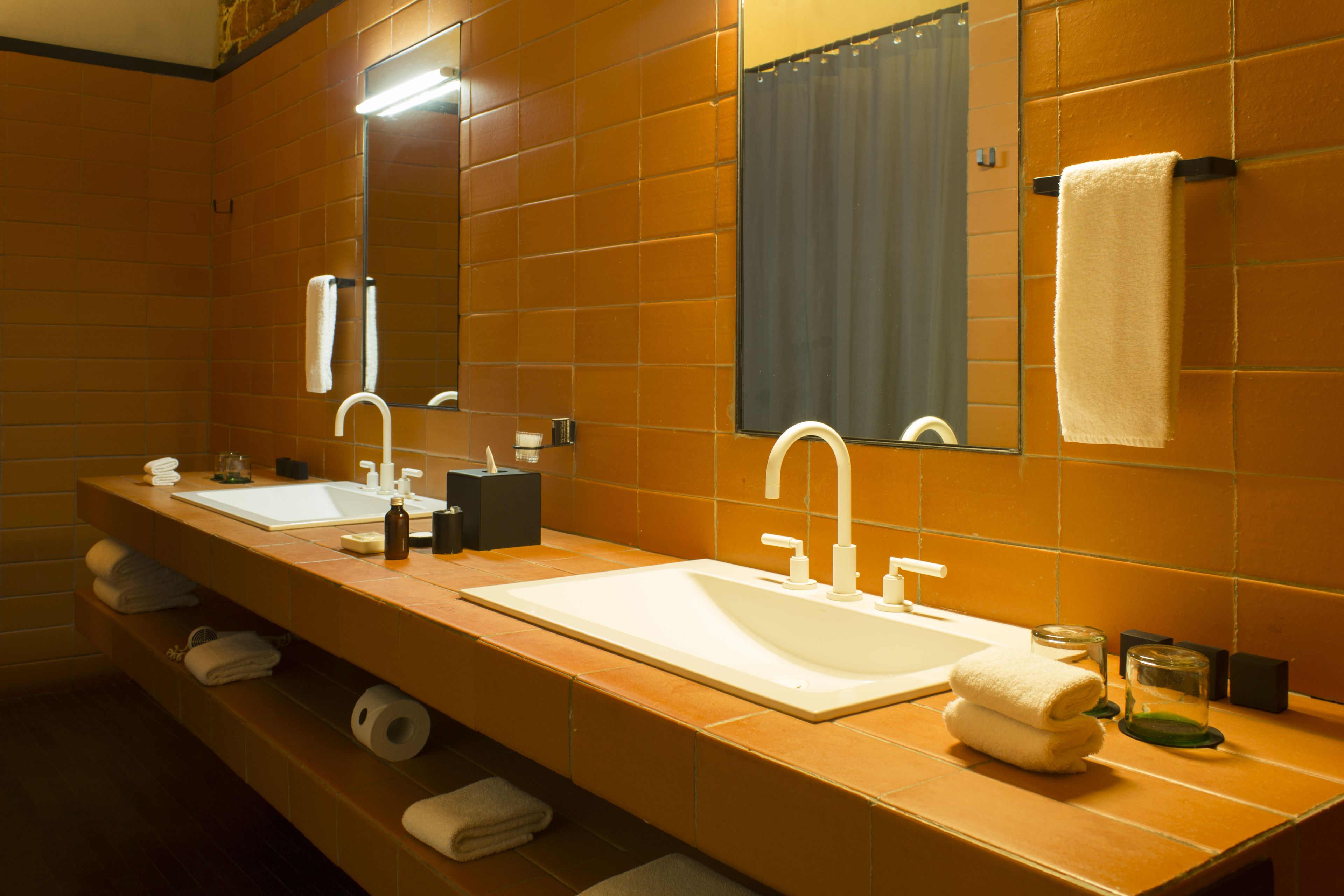 rainfall showerhead, designer toiletries, hair dryer, bathrobes