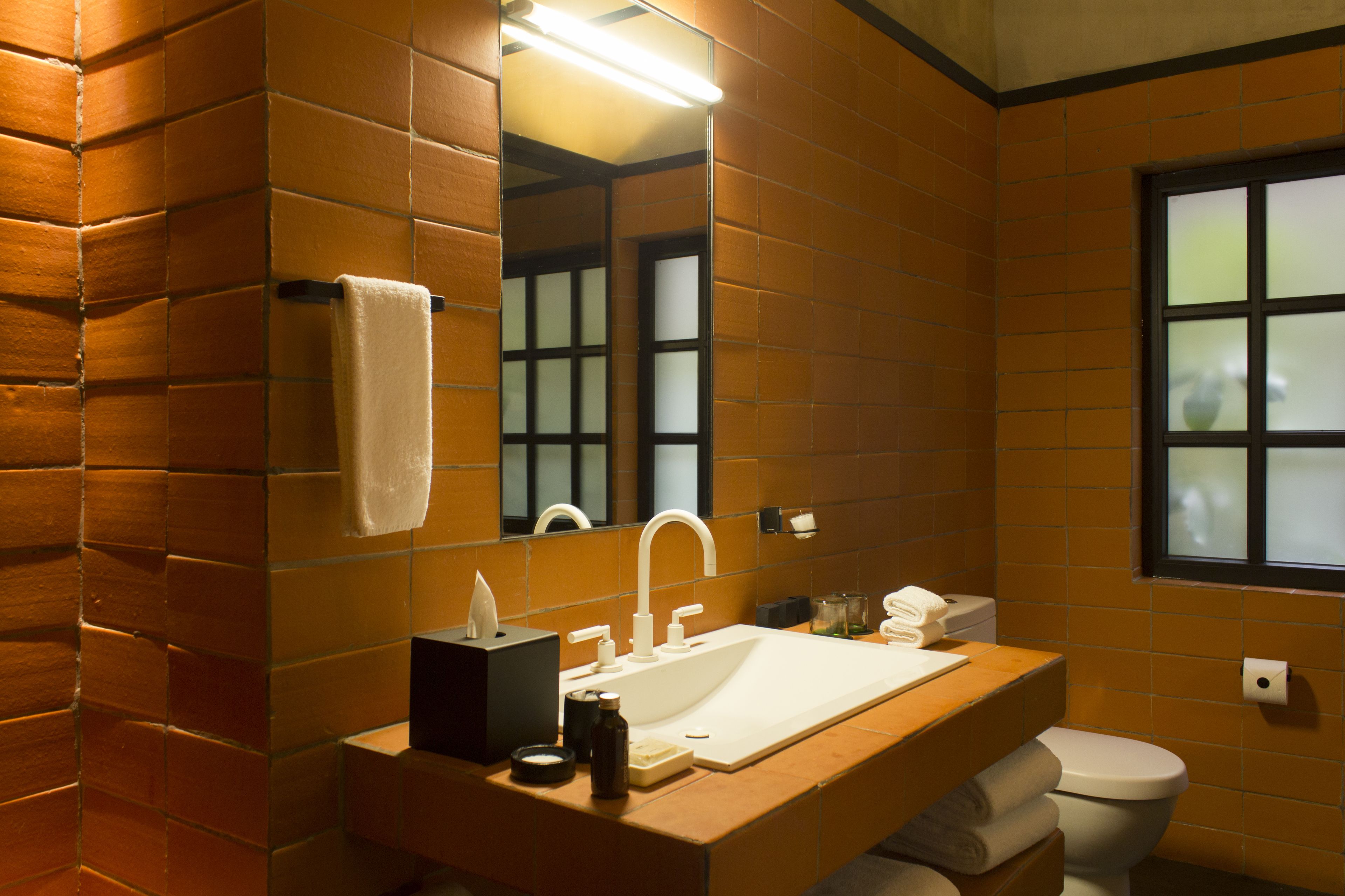 rainfall showerhead, designer toiletries, hair dryer, bathrobes