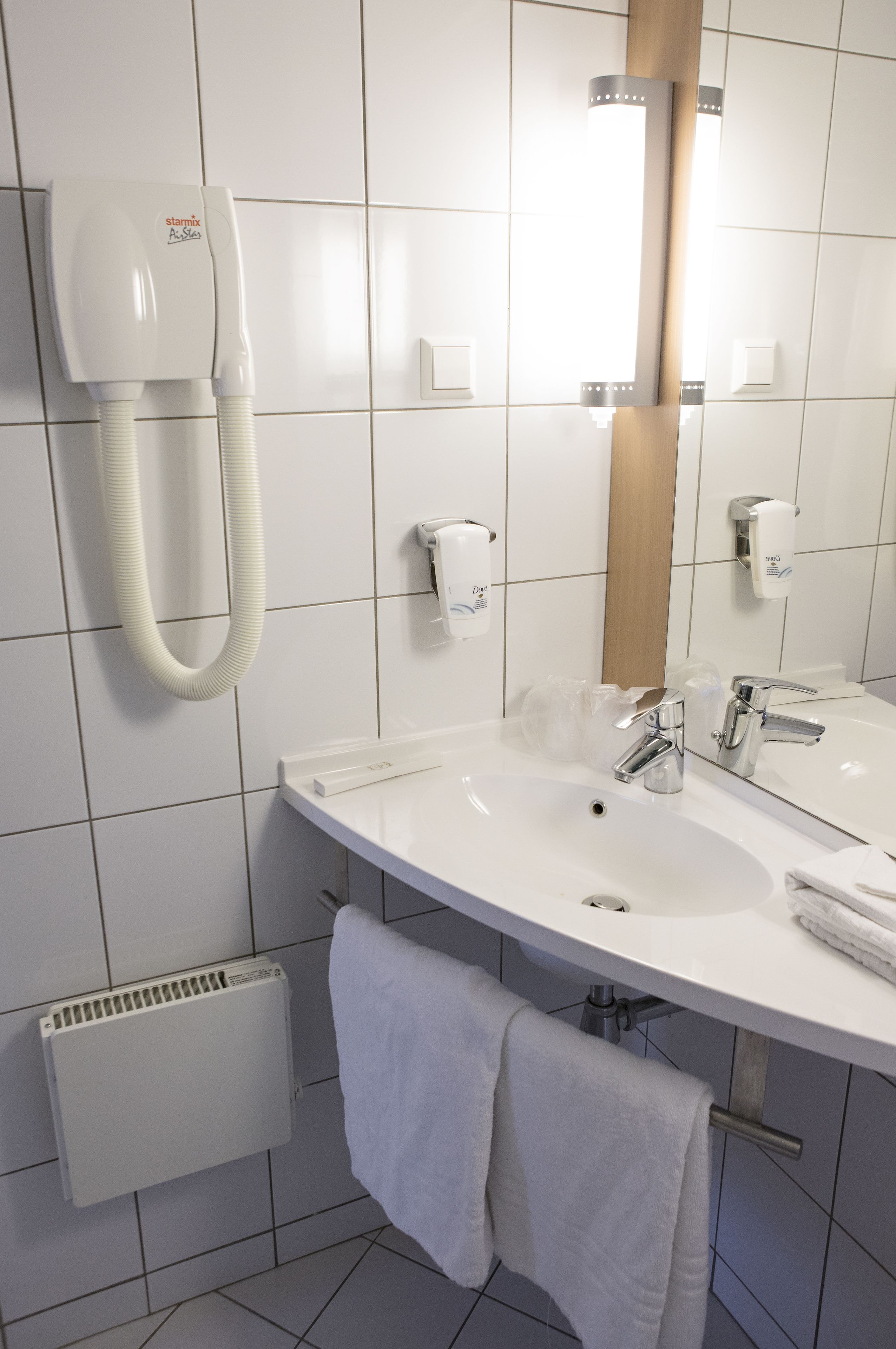 twin room, 2 single beds | bathroom | shower, eco-friendly toiletries, hair dryer, towels