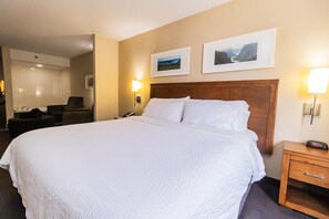 Suite, 1 King Bed, Non Smoking, Jetted Tub | Pillowtop beds, desk, blackout drapes, iron/ironing board - Deer Lake Horizon Hotel, BW Signature Collection (Deer Lake)