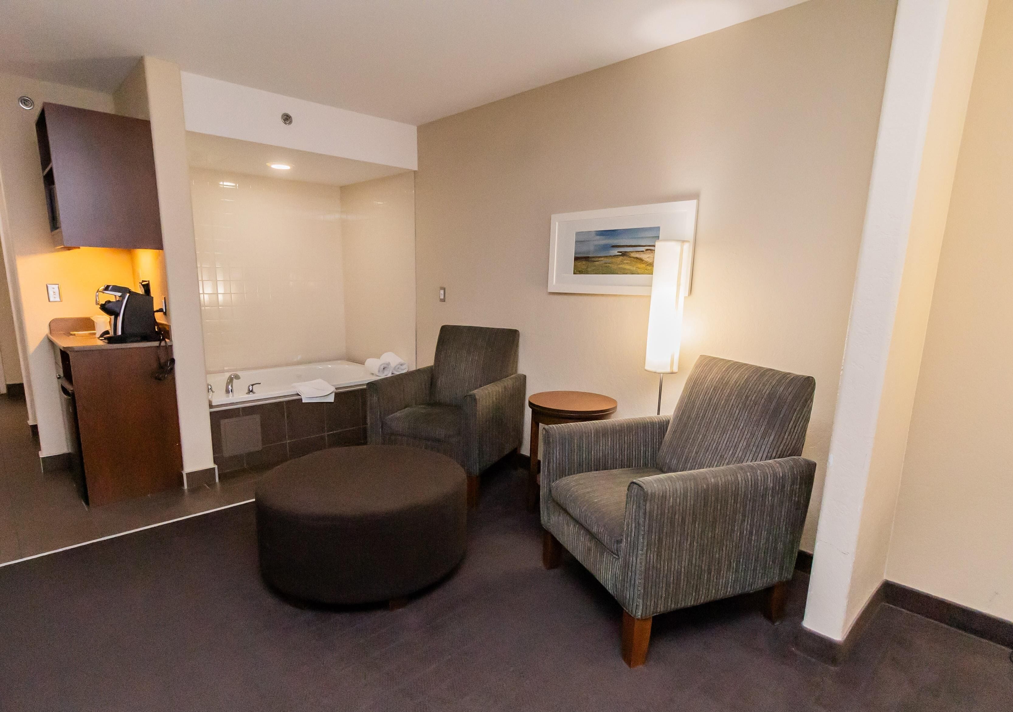 Pillowtop beds, desk, blackout drapes, iron/ironing board