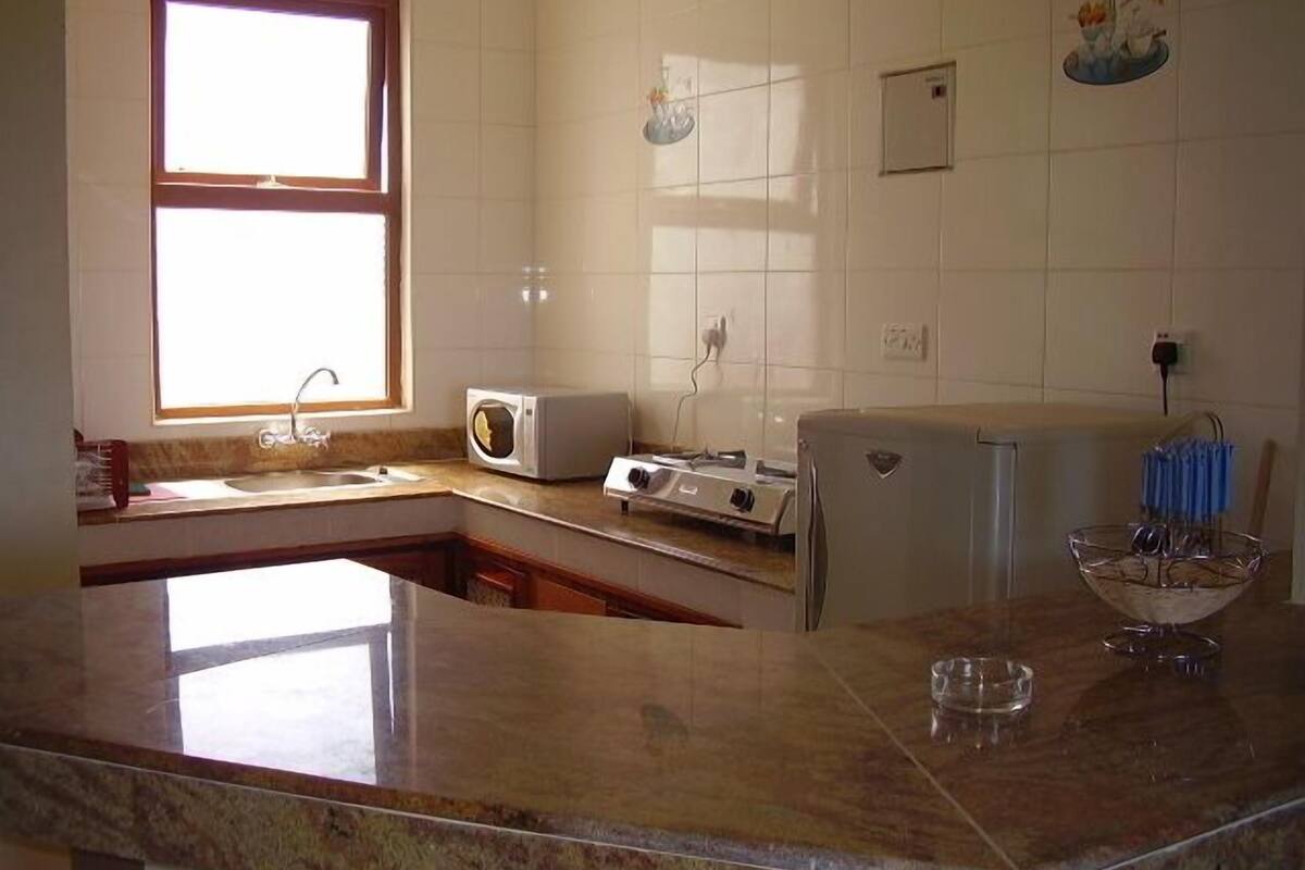 standard cottage, 1 bedroom | private kitchen | fridge