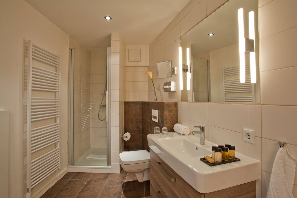 superior room with sauna | bathroom | free toiletries, hair dryer, towels, soap