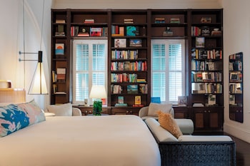 Books & Books King Suite | Premium bedding, in-room safe, individually decorated at Ridley House - Key West Historic Inns