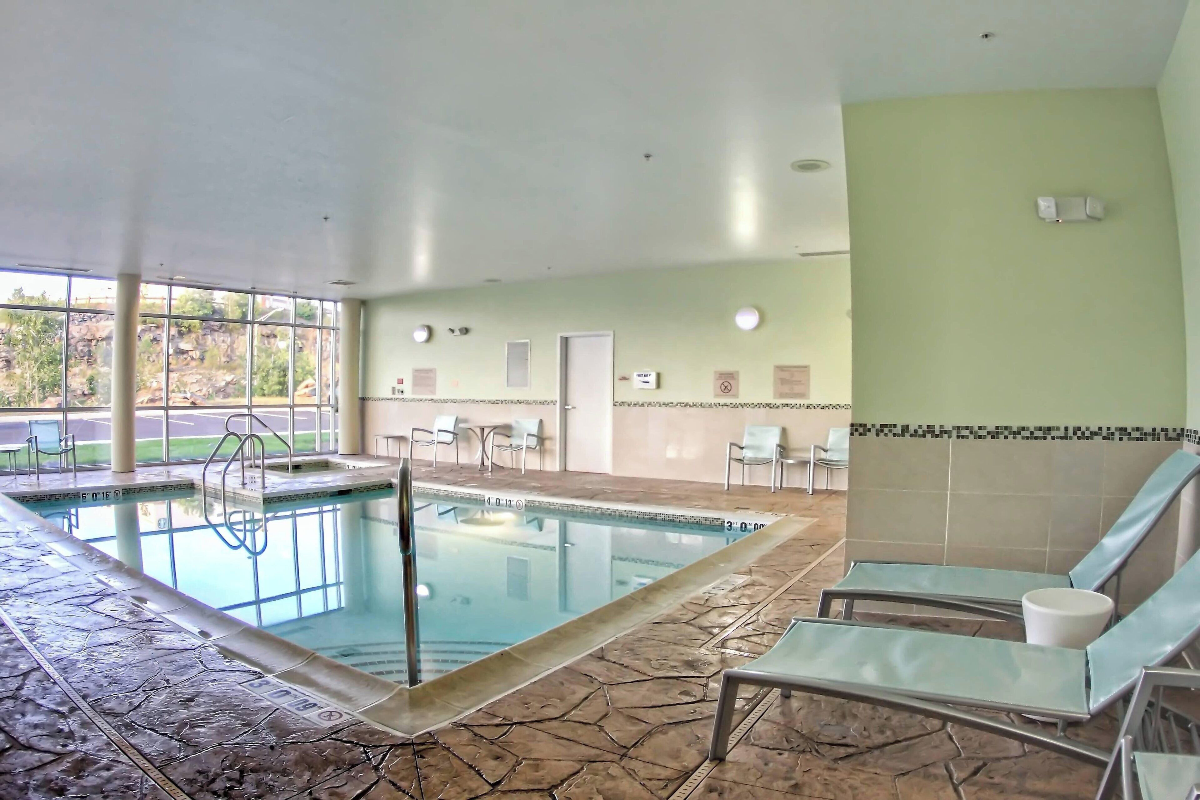 indoor pool, open 7:00 am to 9:00 pm, pool loungers