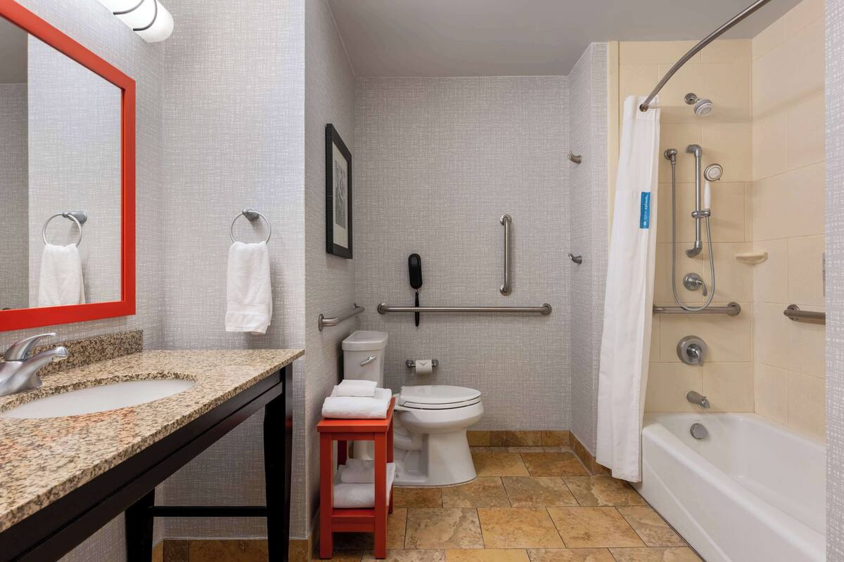 combined shower/bathtub, free toiletries, hair dryer, towels