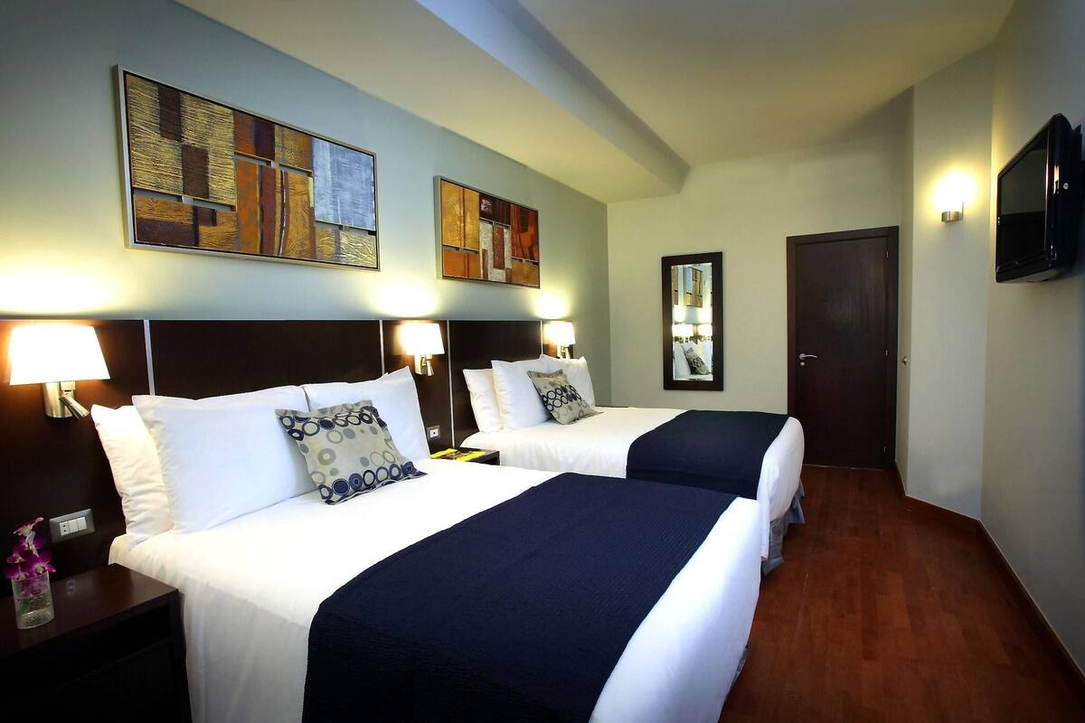 Premium bedding, down comforters, memory foam beds, in-room safe