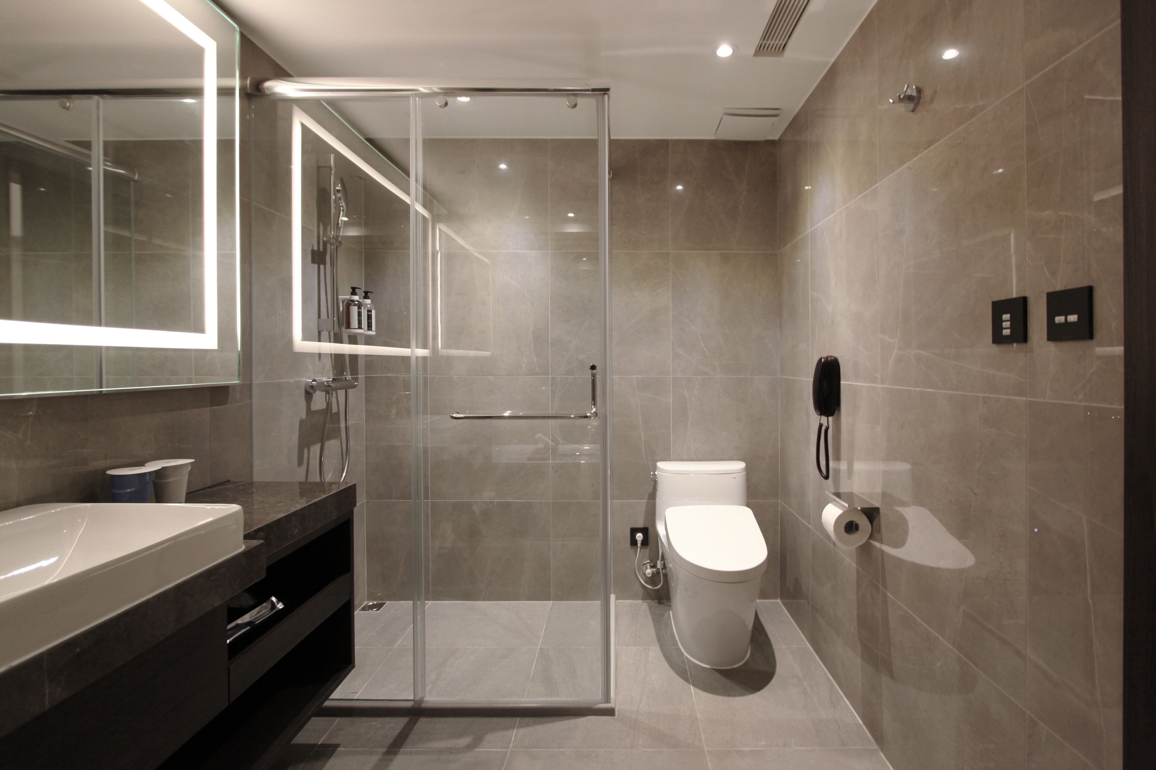 eco-friendly toiletries, hair dryer, bathrobes, slippers