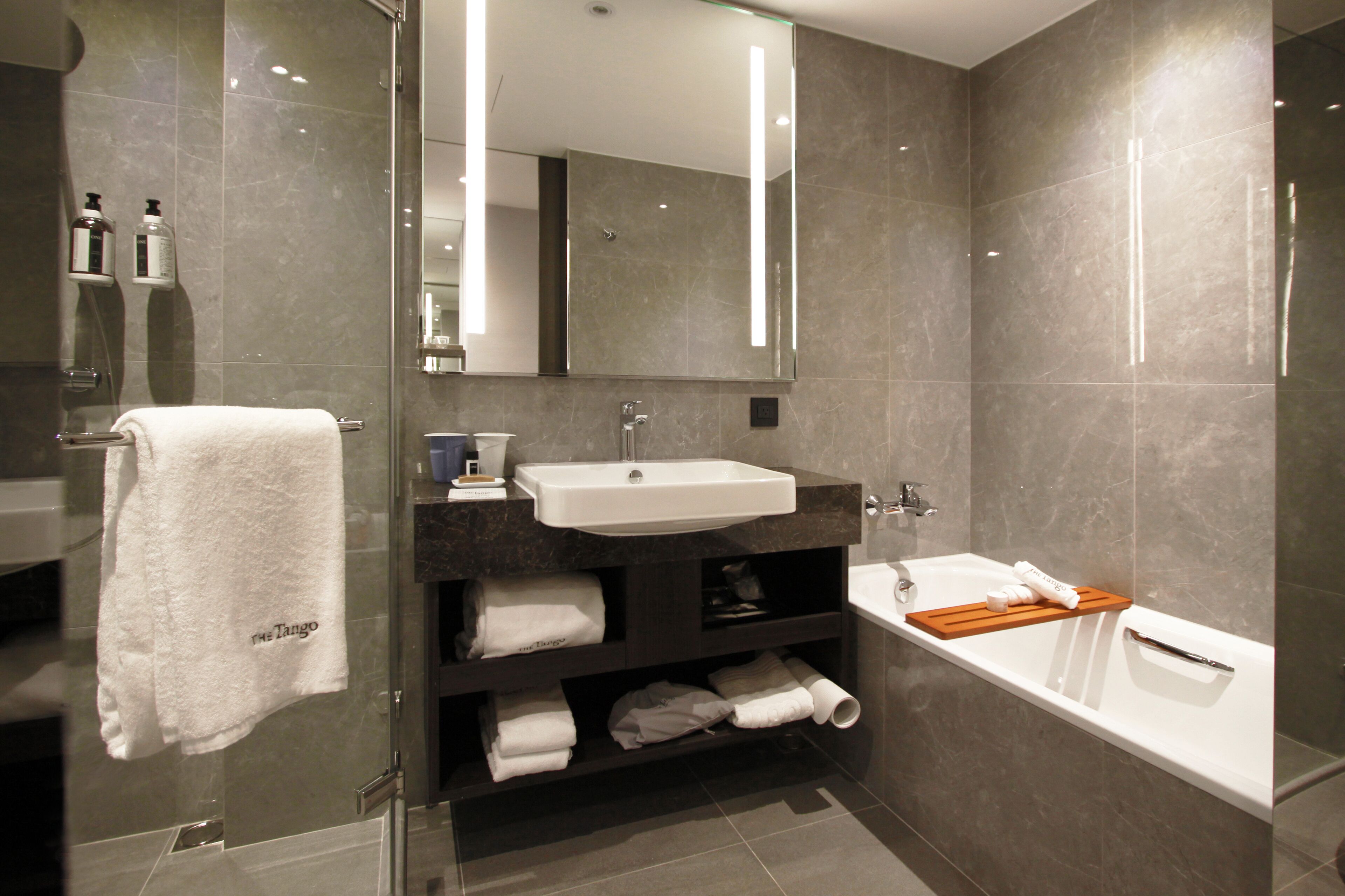 eco-friendly toiletries, hair dryer, bathrobes, slippers