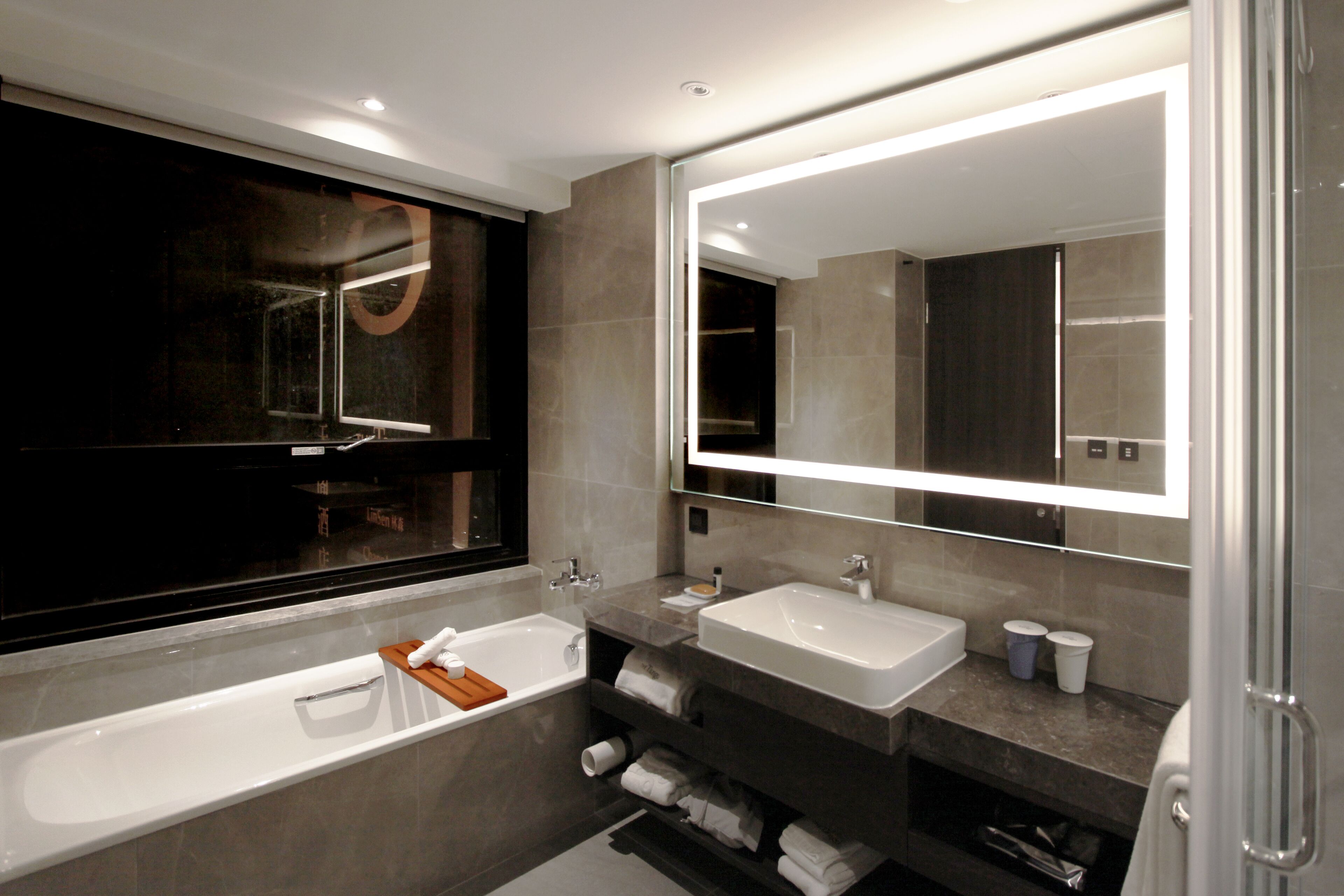 tango suite | bathroom | eco-friendly toiletries, hair dryer, bathrobes, slippers