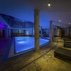 Indoor pool, open 8 AM to 9 PM, pool loungers
