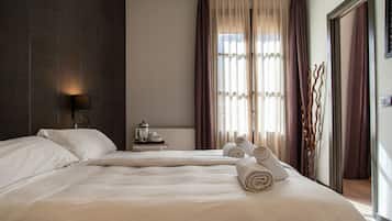 Premium bedding, memory-foam beds, in-room safe, individually decorated