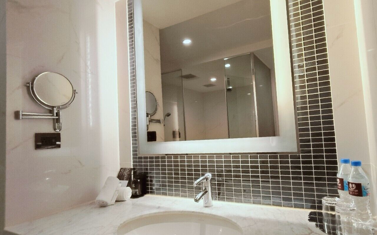 classic quadruple room | bathroom | hair dryer, slippers, electronic bidet, towels
