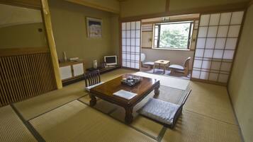 Standard Quadruple Room, 1 Bedroom | Premium bedding, down comforters, in-room safe, desk
