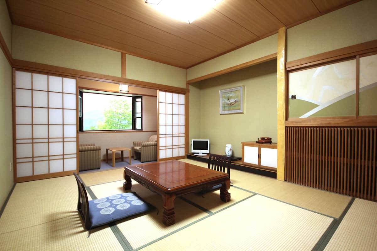 Standard Quadruple Room, 1 Bedroom | Premium bedding, down duvets, in-room safe, desk
