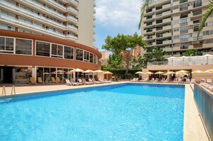 Outdoor pool, open 10:00 AM to 6:00 PM, pool umbrellas, sun loungers
