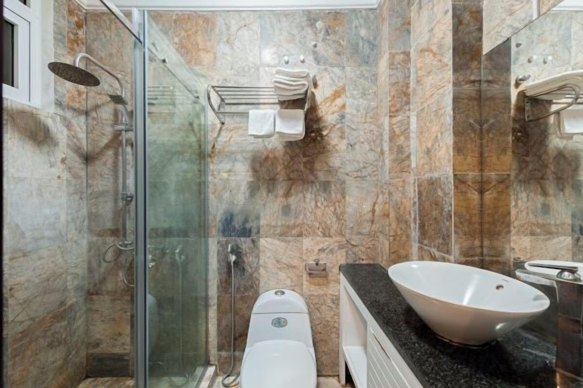 Shower, free toiletries, hair dryer (on request), slippers