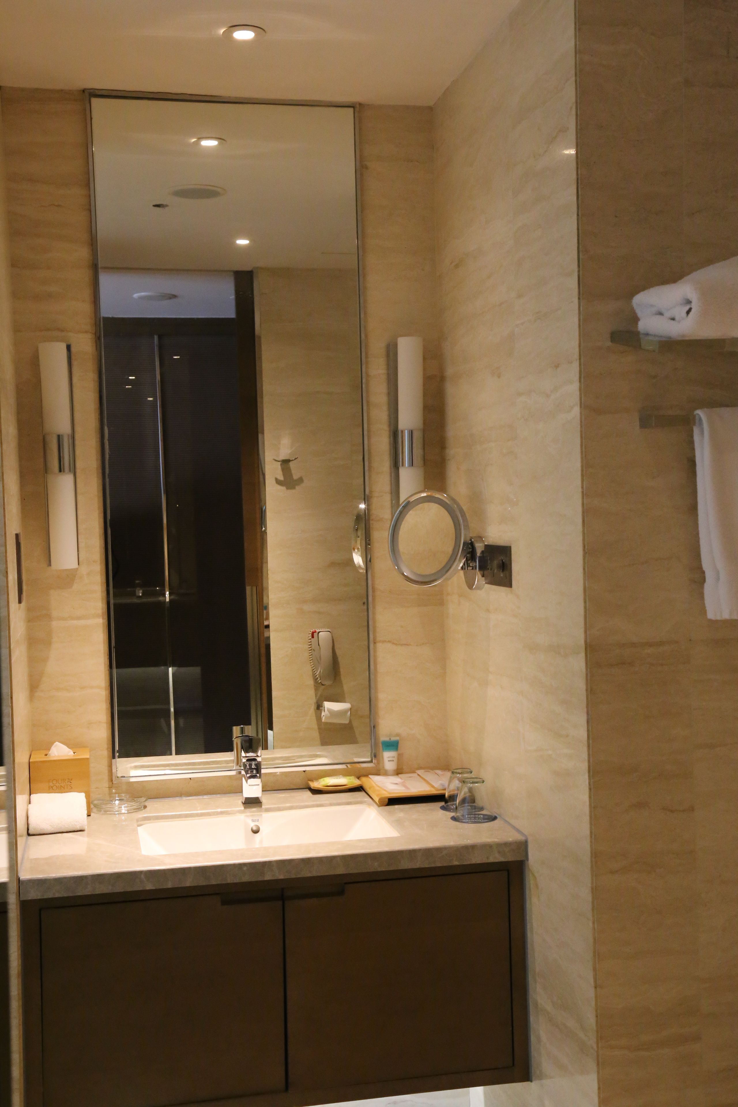 rainfall showerhead, hair dryer, bathrobes, slippers