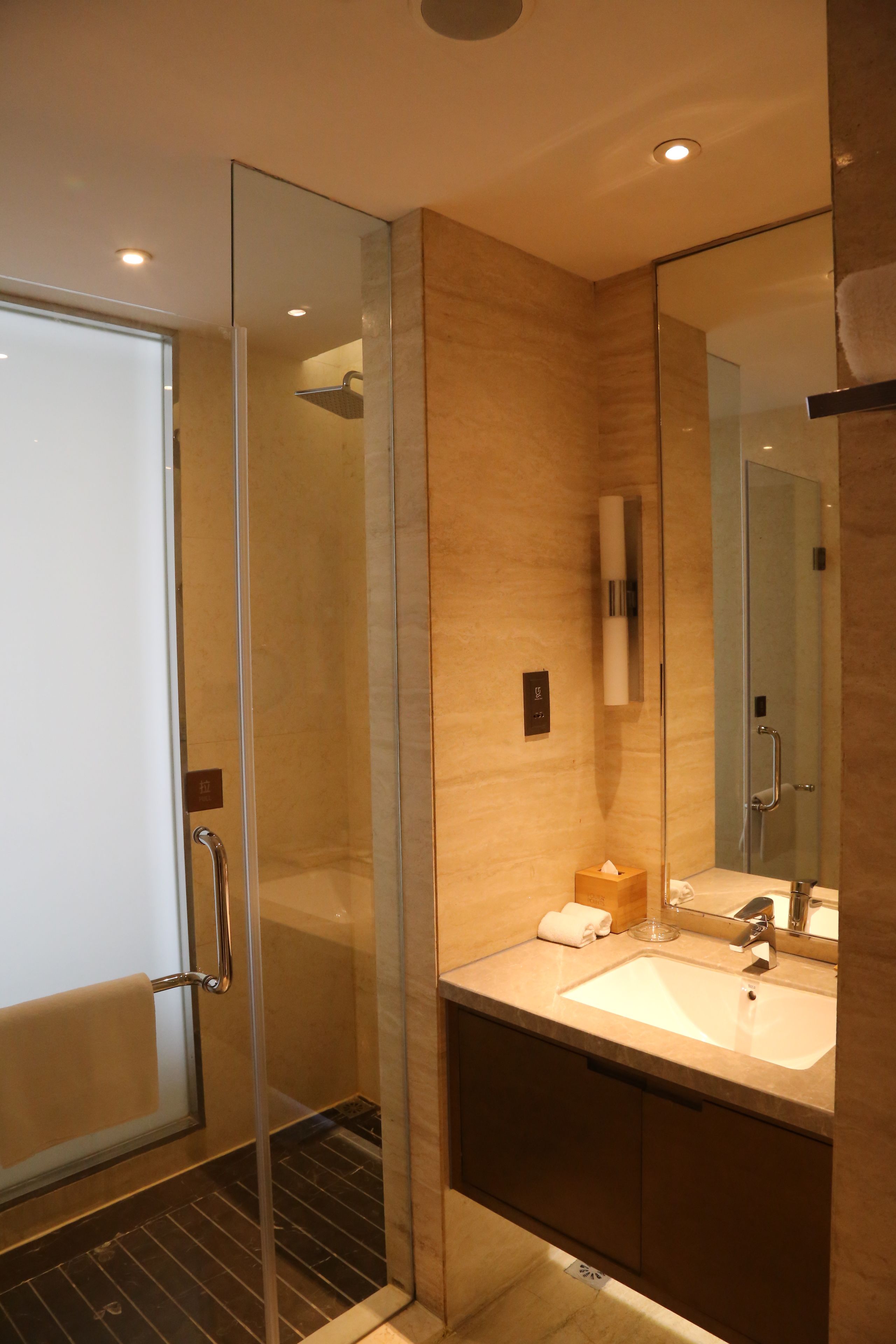 bathroom | rainfall showerhead, hair dryer, bathrobes, slippers