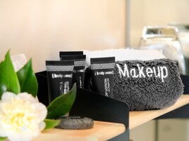 Hair dryer, towels, soap, shampoo