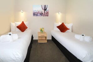 One Bedroom Unit | Blackout drapes, iron/ironing board, free cribs/infant beds, free WiFi