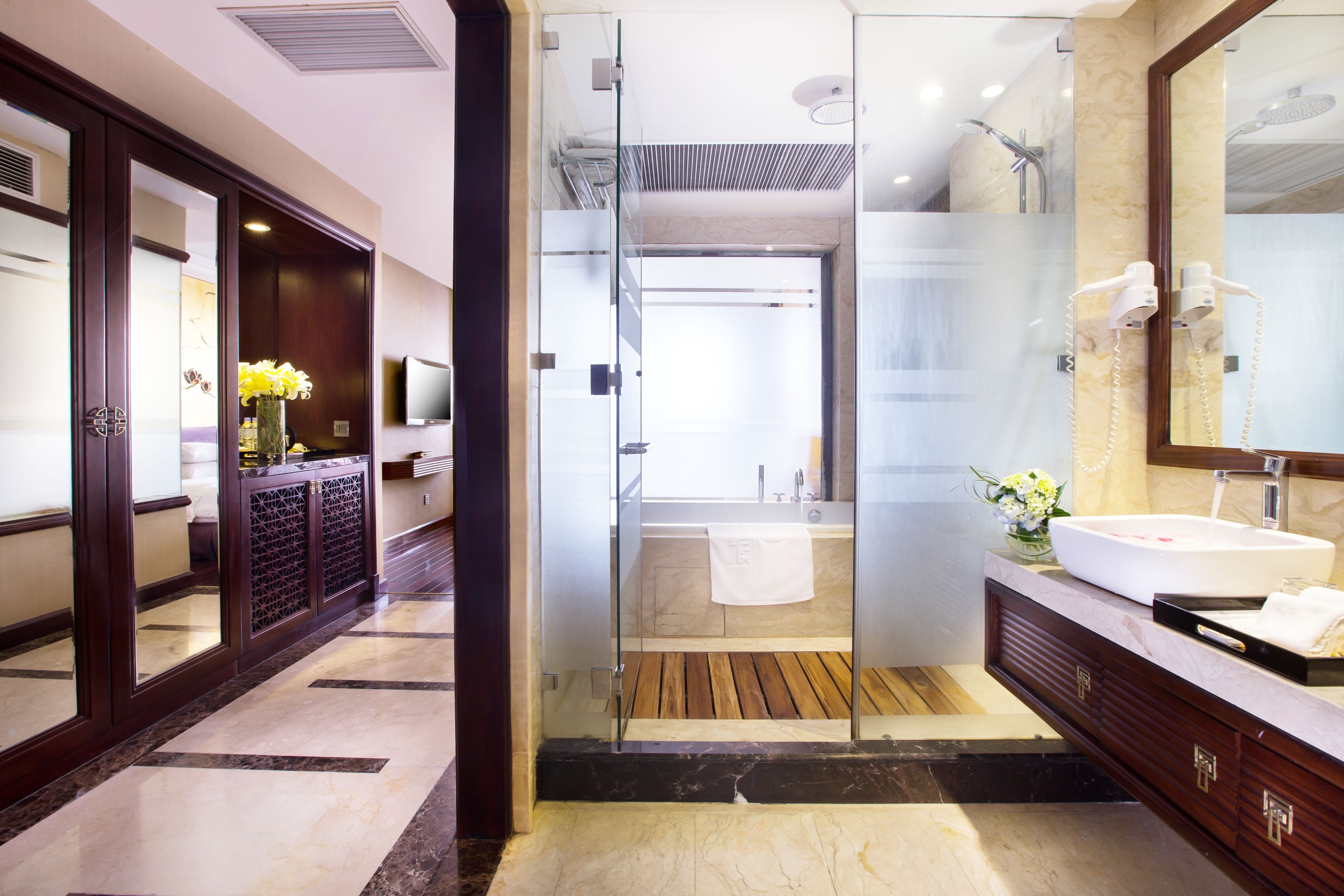 deep-soaking bathtub, free toiletries, hair dryer, bathrobes