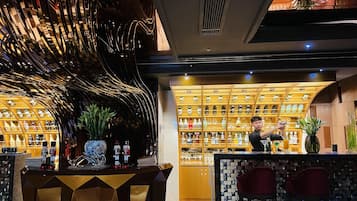 2 bars/lounges, rooftop bar