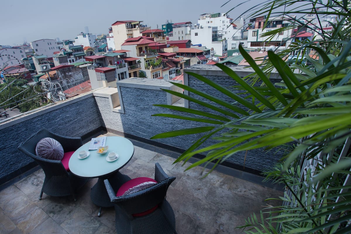 Suite luxueuse, terrasse, vue sur la ville | Terrasse/patio