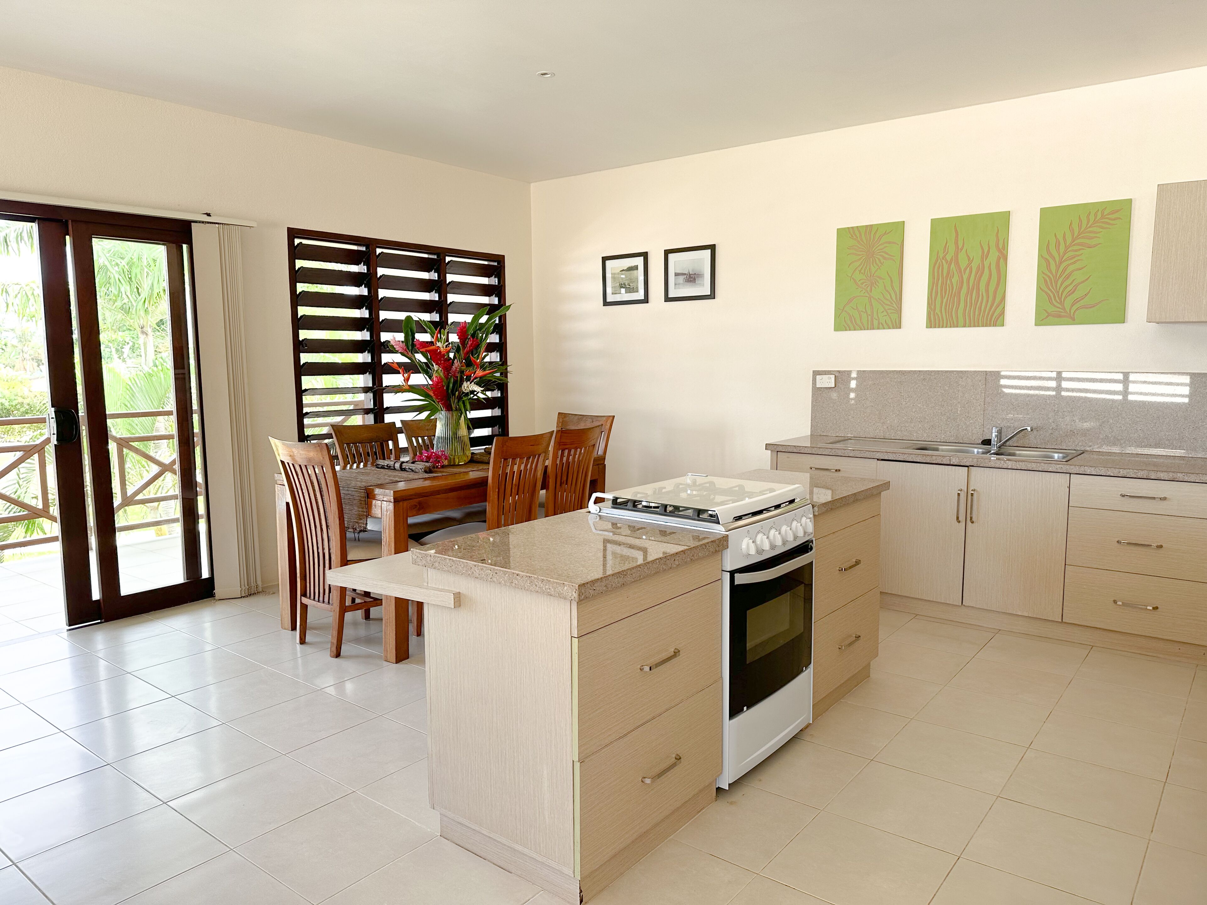 pool view two-bedroom apartment | private kitchen | full-sized fridge, coffee/tea maker, electric kettle, toaster