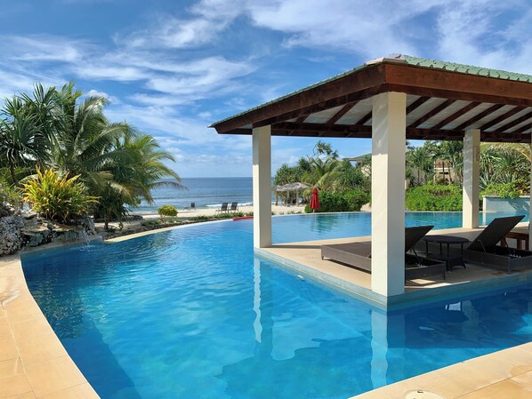 Outdoor pool, pool umbrellas, sun loungers