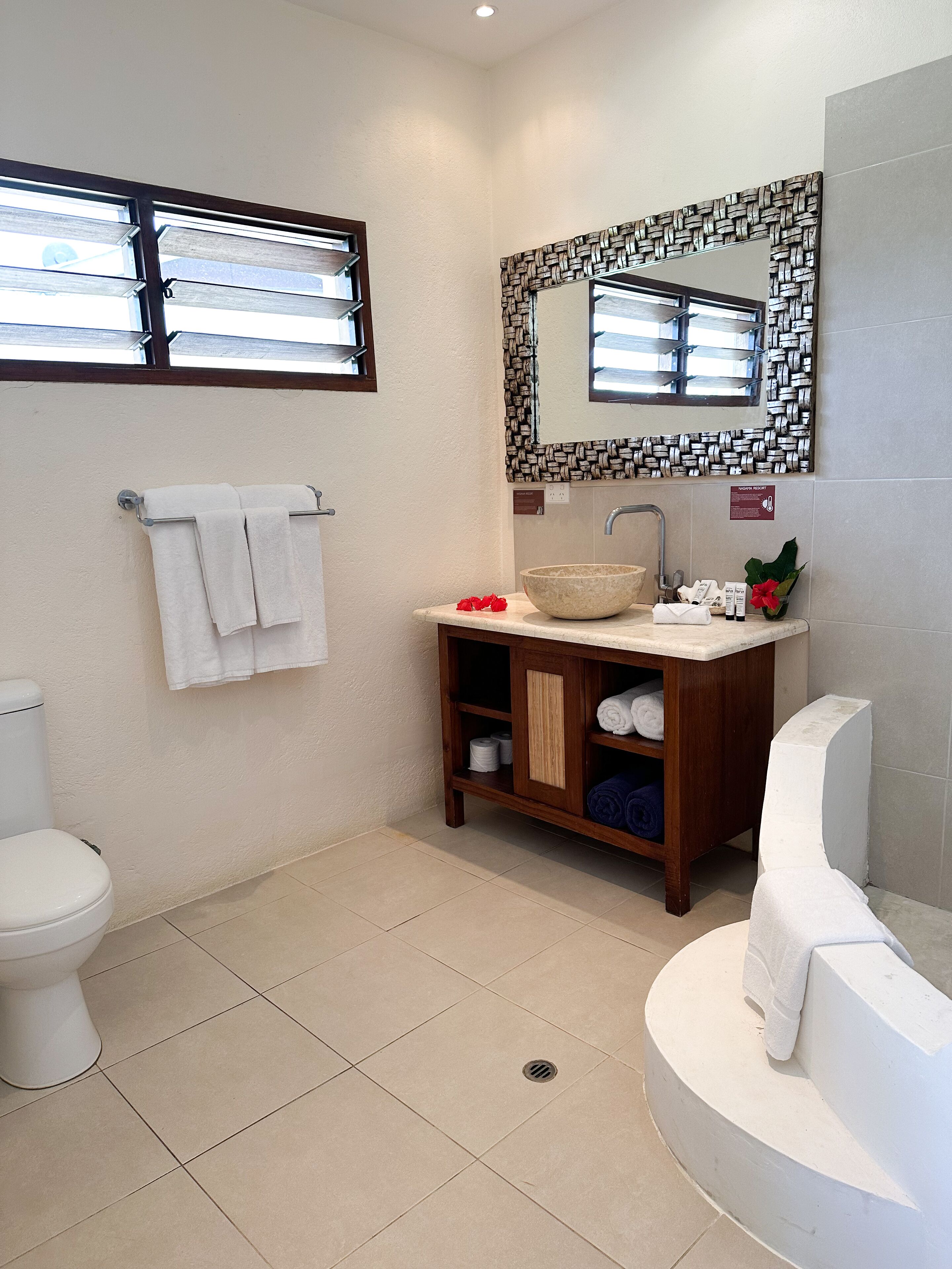 pool view two-bedroom apartment | bathroom | shower, free toiletries, hair dryer, towels